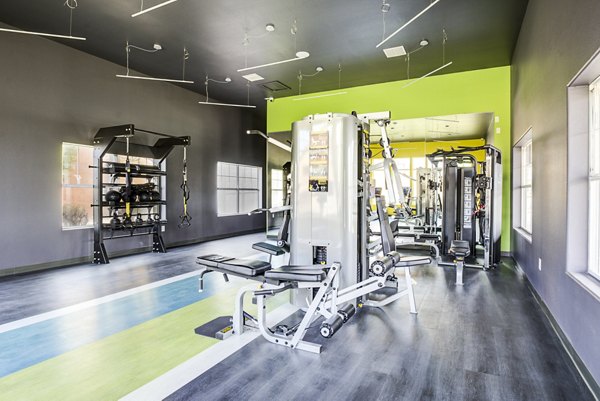 Modern fitness center with state-of-the-art equipment at Lumen Apartments, perfect for active residents seeking a healthy lifestyle