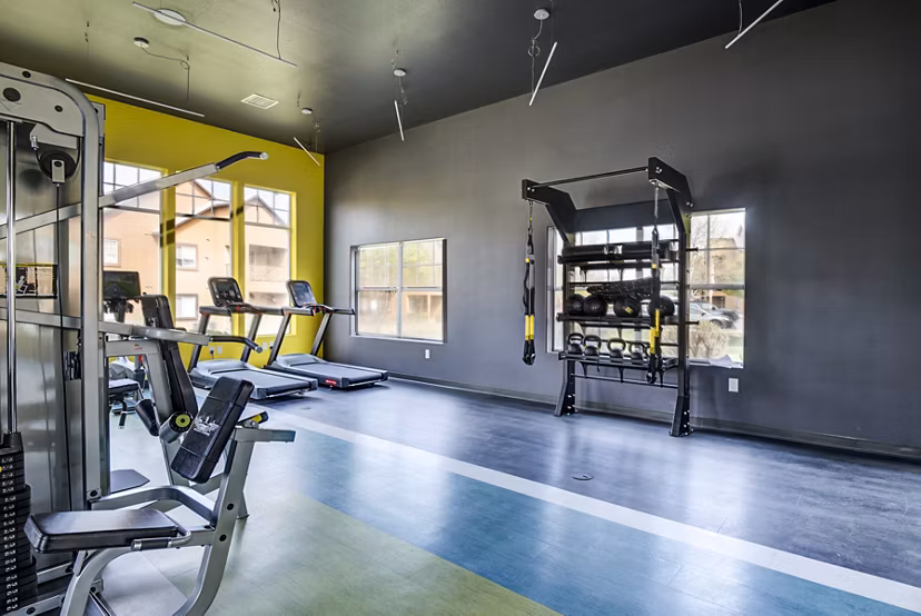 Modern fitness center with state-of-the-art equipment at Lumen Apartments