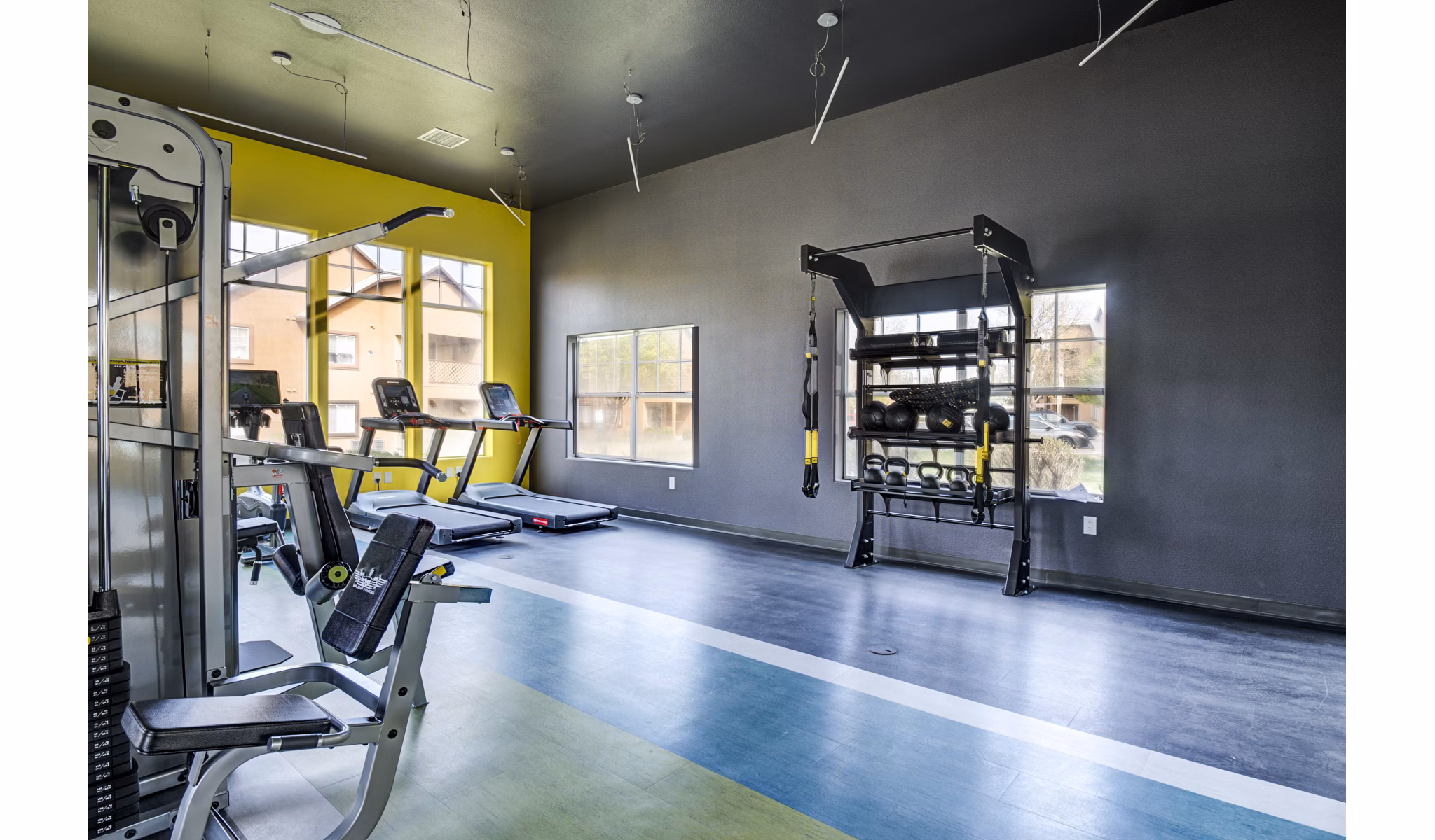 Modern fitness center with state-of-the-art equipment at Lumen Apartments