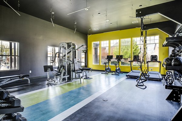 Fitness center with modern equipment at Lumen Apartments for an active lifestyle