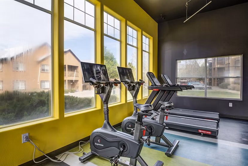 State-of-the-art fitness center at Lumen Apartments with modern equipment, perfect for maintaining an active lifestyle in a luxury setting