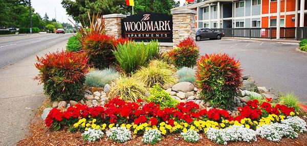 signage at The Woodmark Apartments