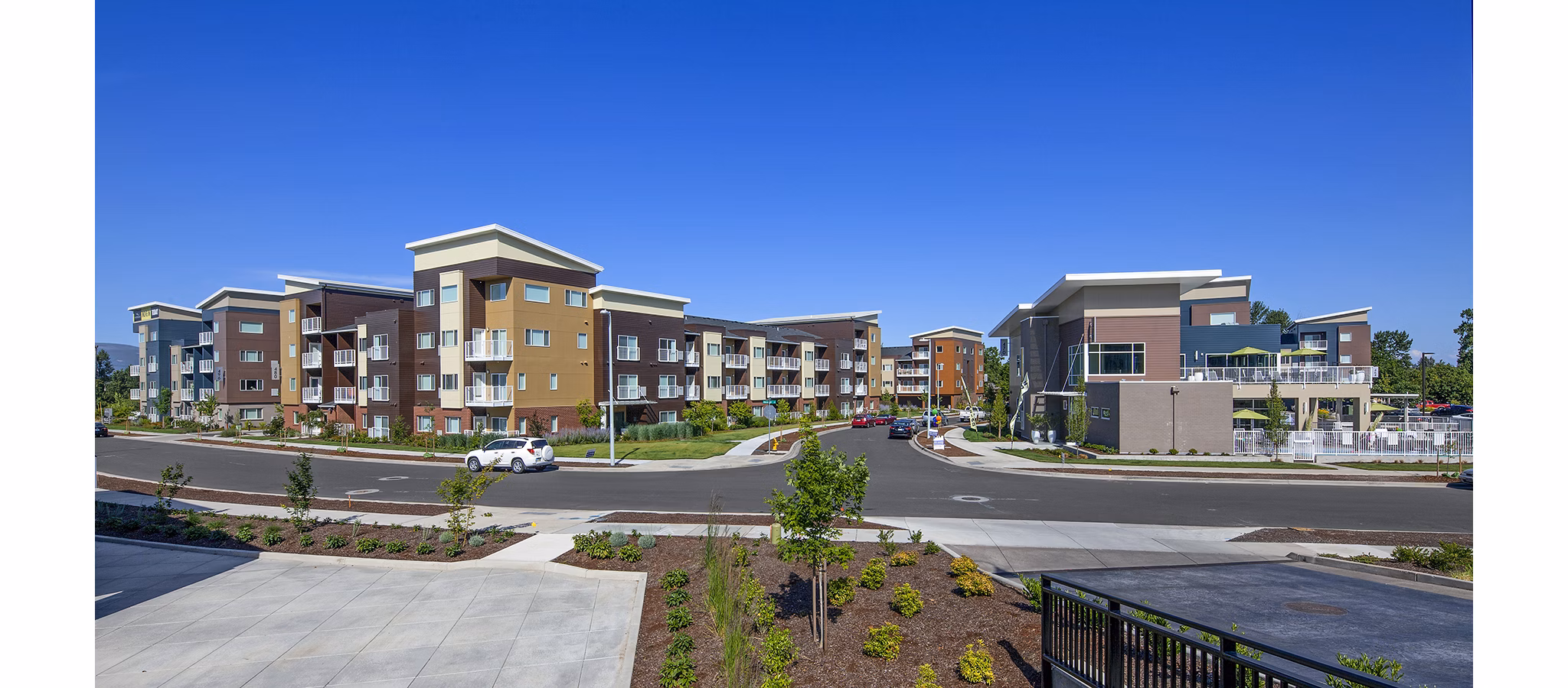 Riverwalk Apartments: Elegant view of luxury apartments in a serene riverside location