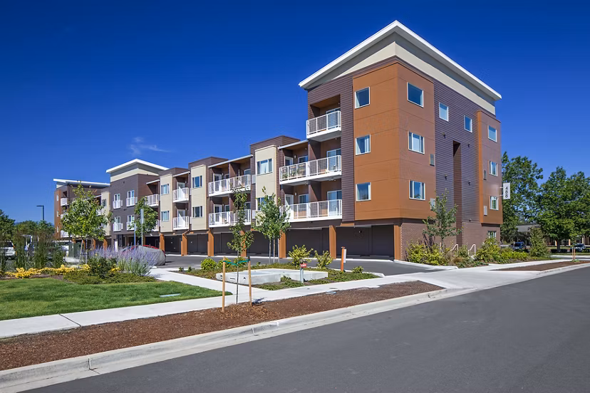 Riverwalk Apartments: Luxurious waterfront apartments featuring lush landscaping in a serene setting