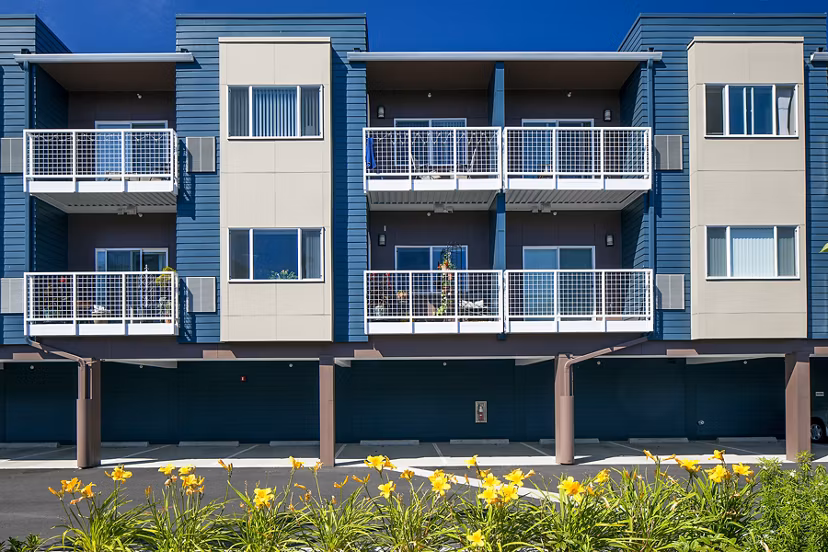 Riverwalk Apartments: Covered parking garage offering convenient access for residents in luxury living community