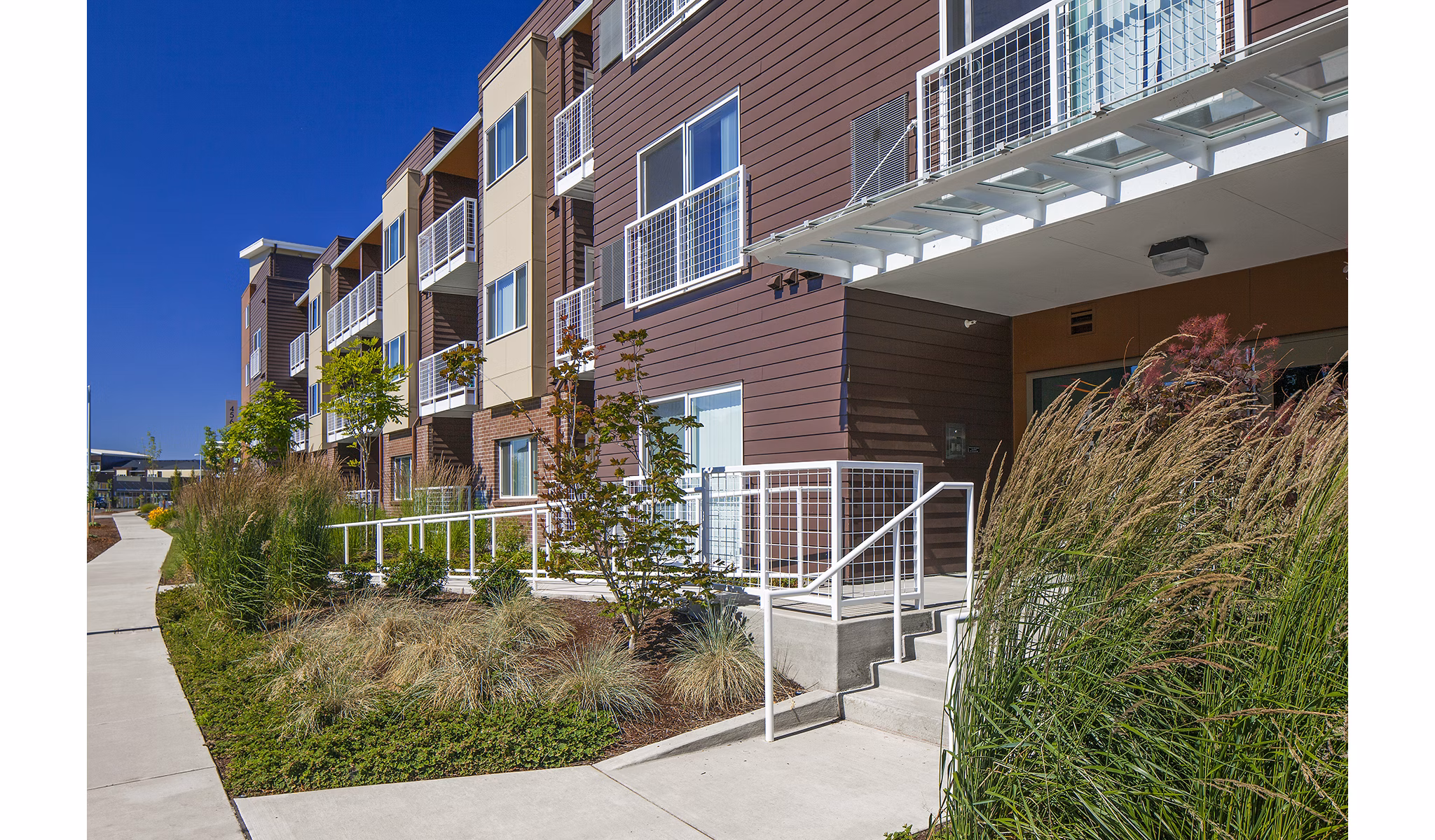 Riverwalk Apartments: Elegant architecture of luxury apartments in vibrant urban setting