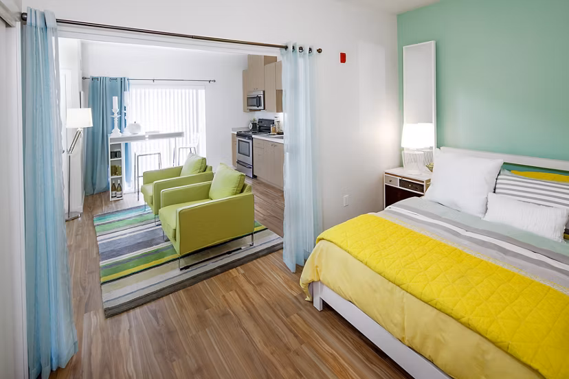 Cozy studio bedroom with modern dÃ©cor at Riverwalk Apartments