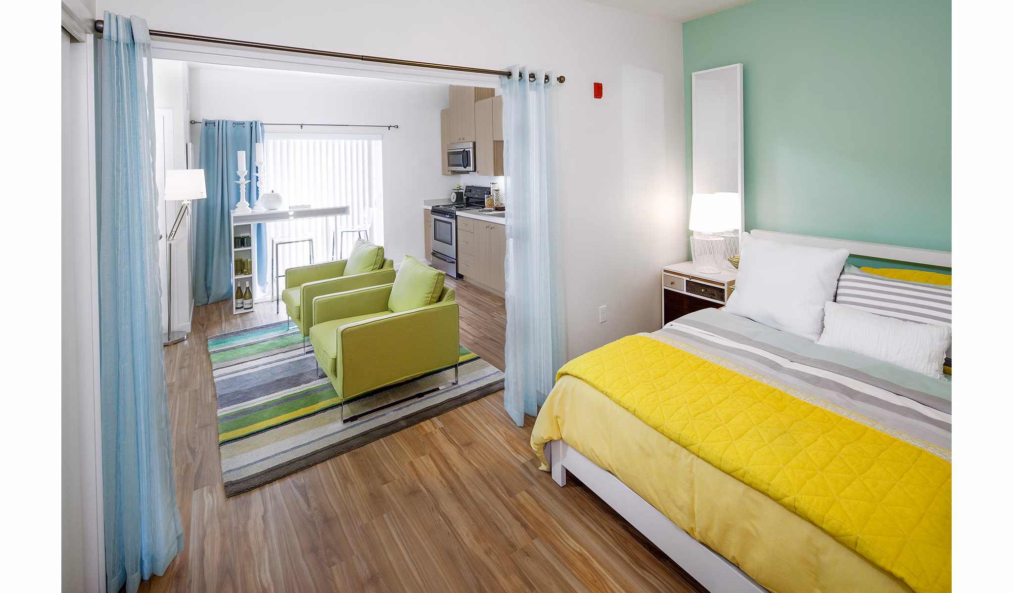 Cozy studio bedroom with modern dÃ©cor at Riverwalk Apartments