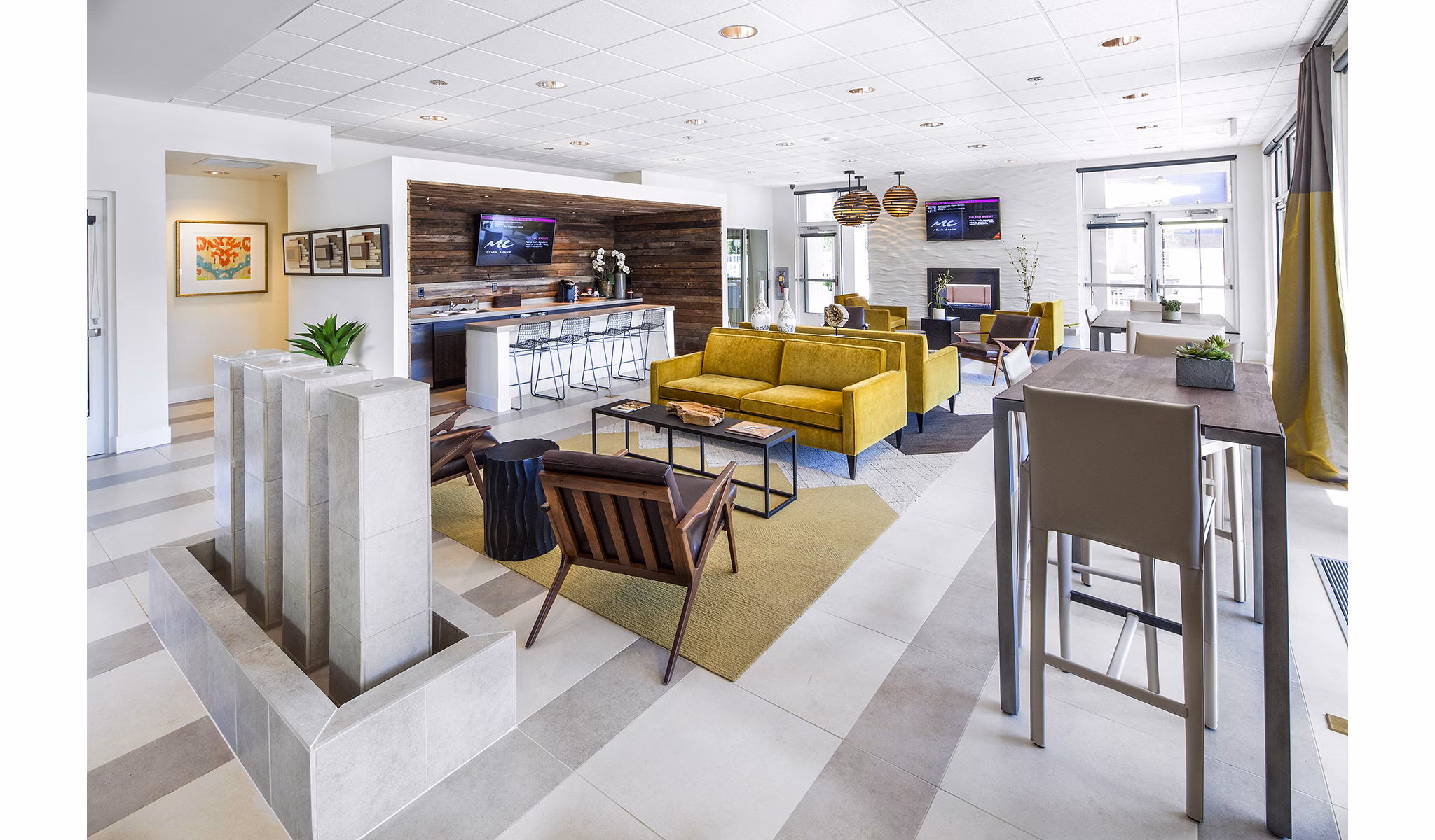 Clubhouse with modern decor at Riverwalk Apartments, featuring luxury amenities for leisure and social gatherings