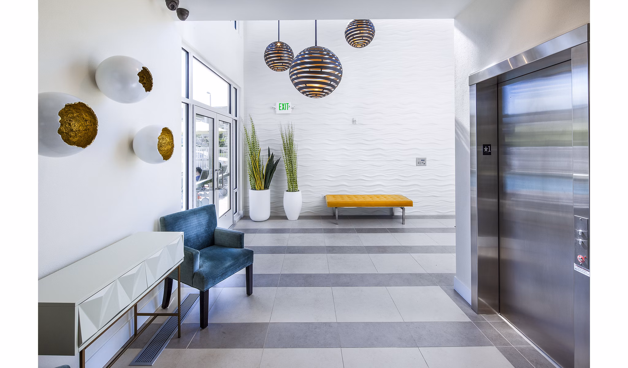 Luxurious clubhouse lobby with modern seating and stylish decor at Riverwalk Apartments