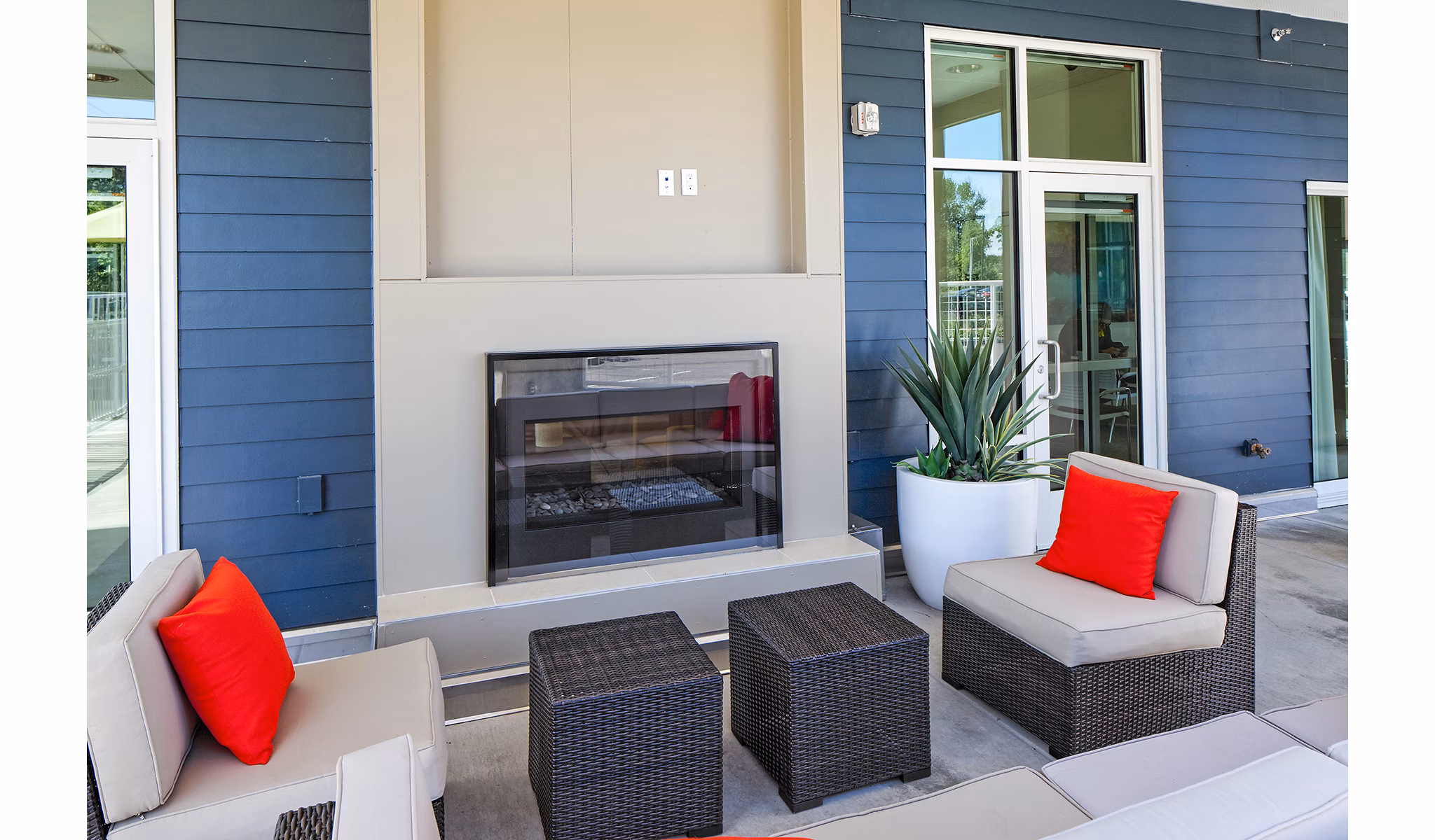 Cozy outdoor fire pit area at Riverwalk Apartments offering a warm gathering spot for residents