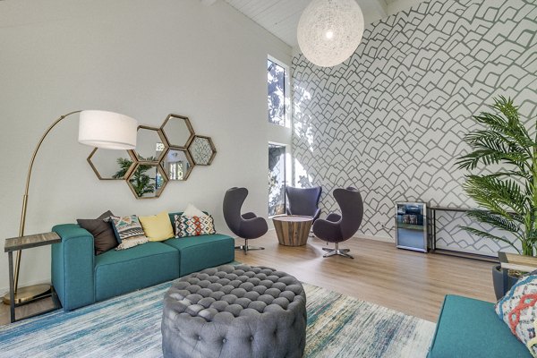 The Hilltop Apartments: Luxurious clubhouse with modern amenities in a vibrant community setting
