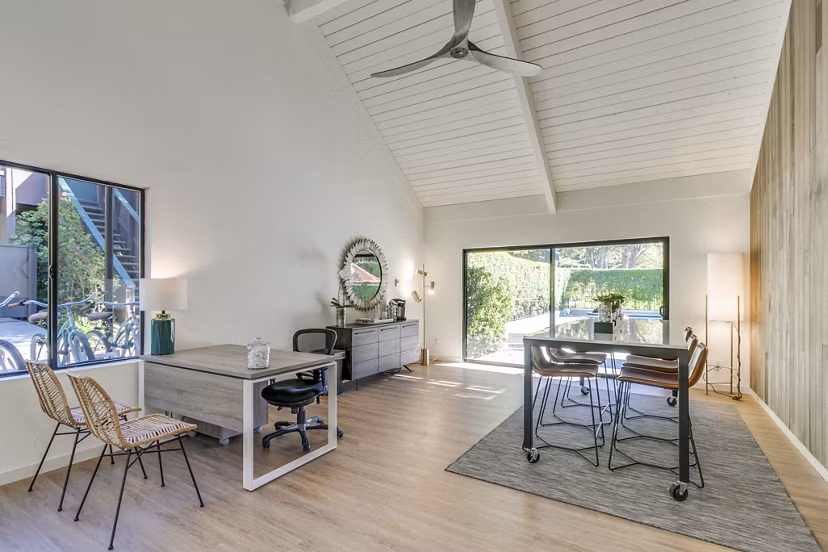 The Hilltop Apartments: Modern clubhouse with stylish seating and natural light, enhancing luxury apartment living in city setting