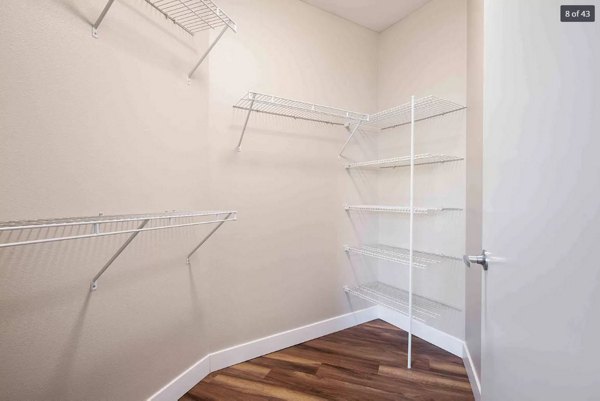 Spacious bedroom with modern decor at The Pacifica Apartments