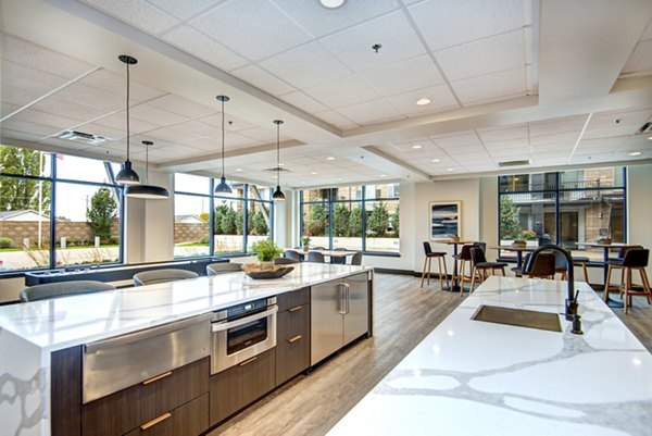 Elegant clubhouse featuring modern design at The Pacifica Apartments, ideal for gatherings and leisure activities in a luxury living setting