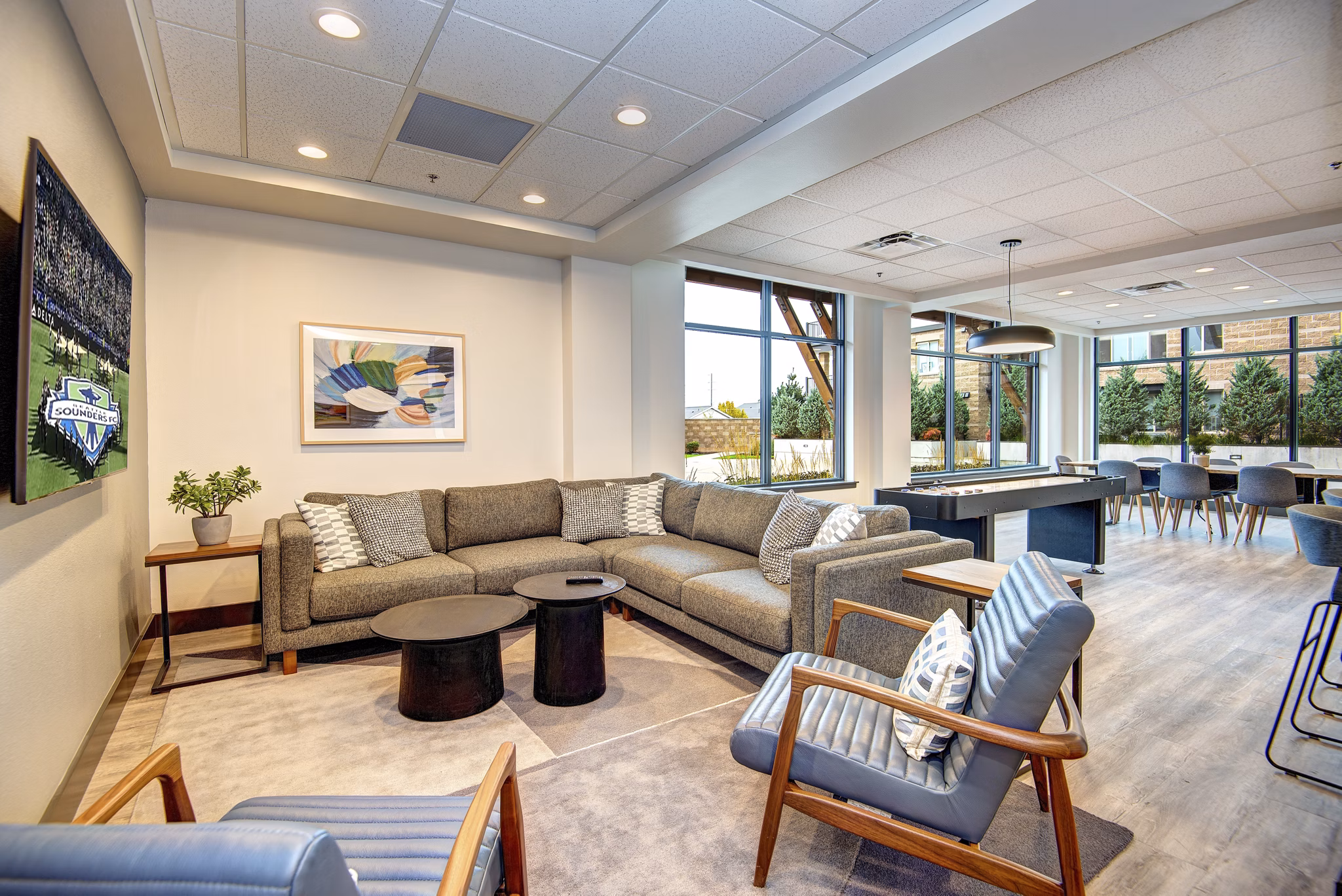 Clubhouse with modern design and entertainment spaces at The Pacifica Apartments
