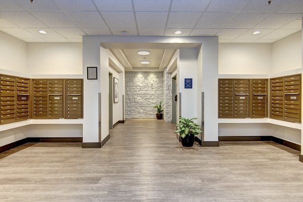 Modern mail room with secure parcel lockers at The Pacifica Apartments, offering convenience for residents in a luxury setting