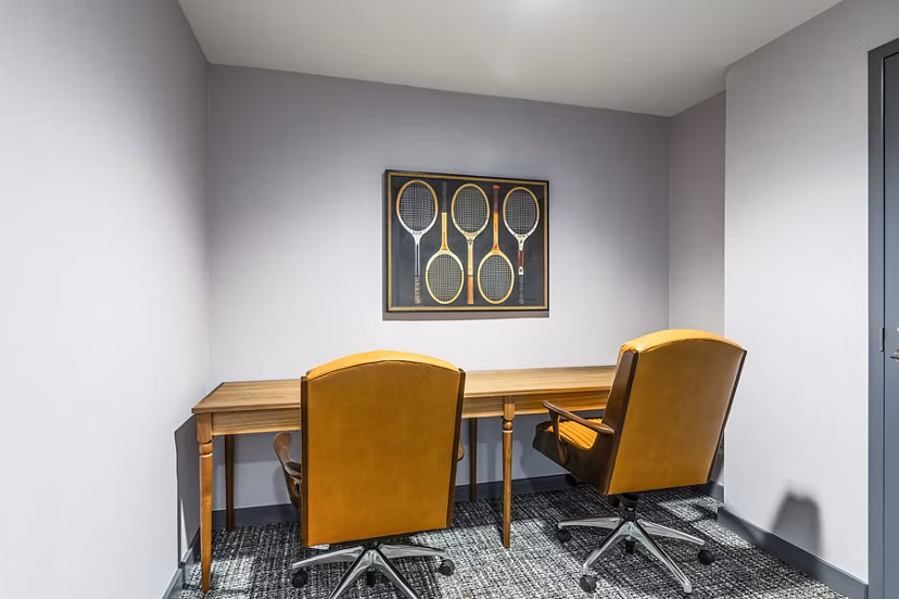 Modern study area with ergonomic chairs and ample lighting at Delwyn Apartments, a Greystar luxury community