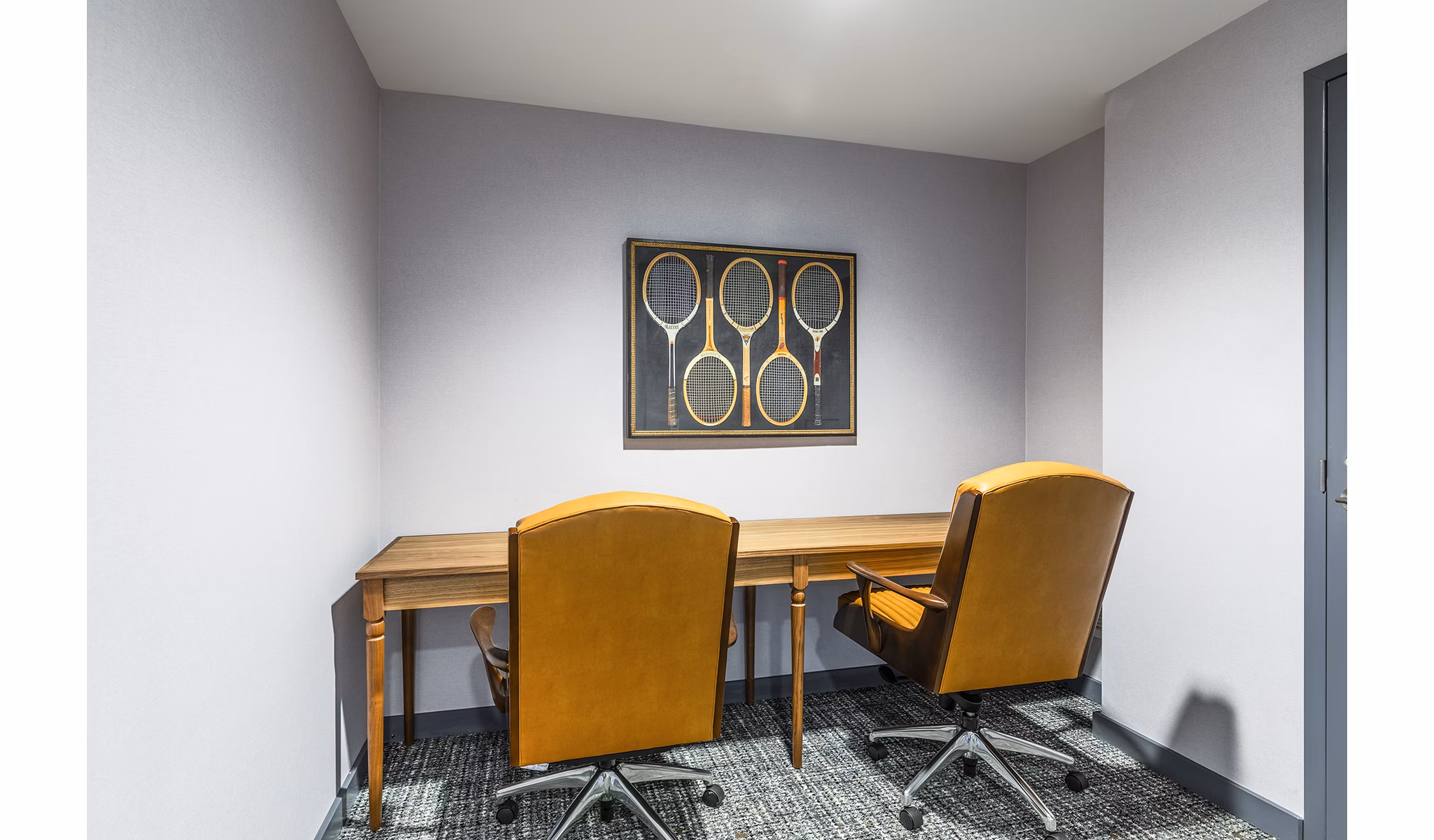 Modern study area with ergonomic chairs and ample lighting at Delwyn Apartments, a Greystar luxury community