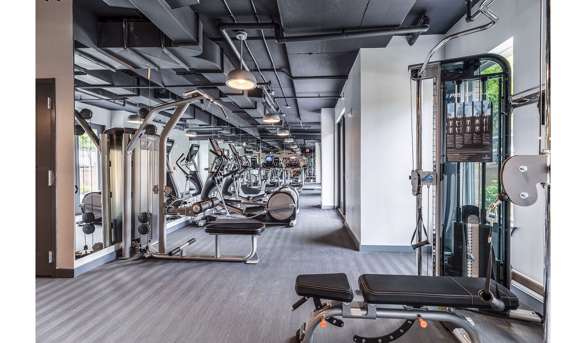 State-of-the-art fitness center with modern equipment at Delwyn Apartments