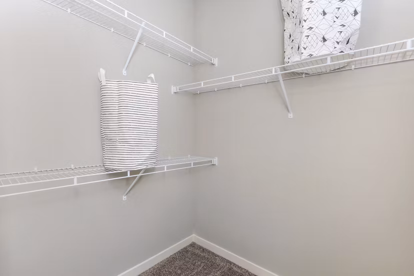 Closet featuring ample shelving and storage space in Vantage at Boerne Apartments luxury apartments