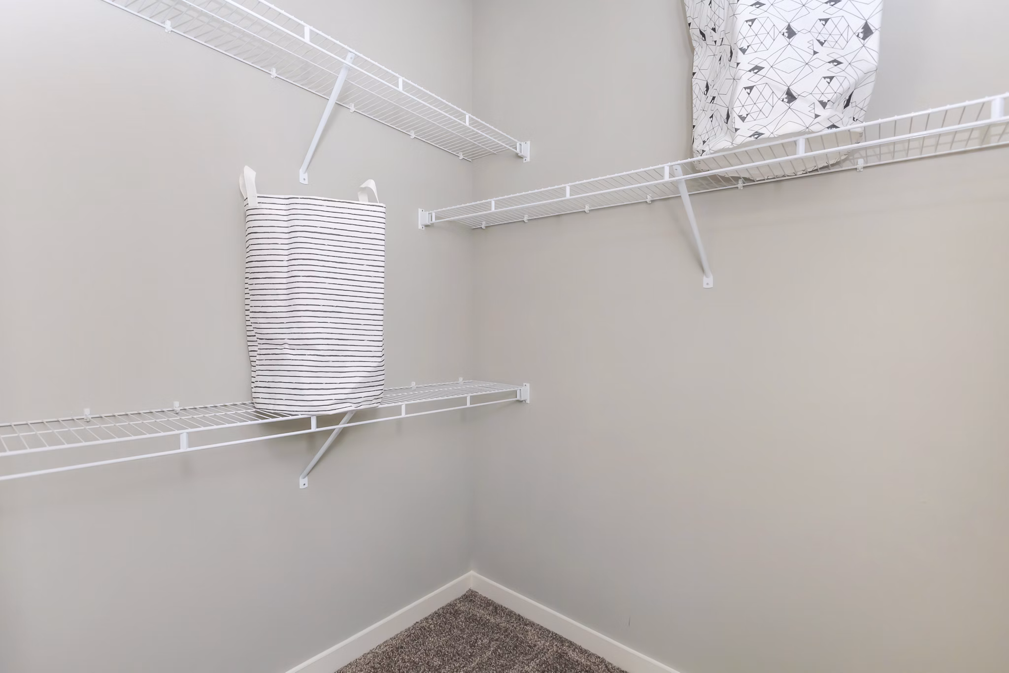 Closet featuring ample shelving and storage space in Vantage at Boerne Apartments luxury apartments