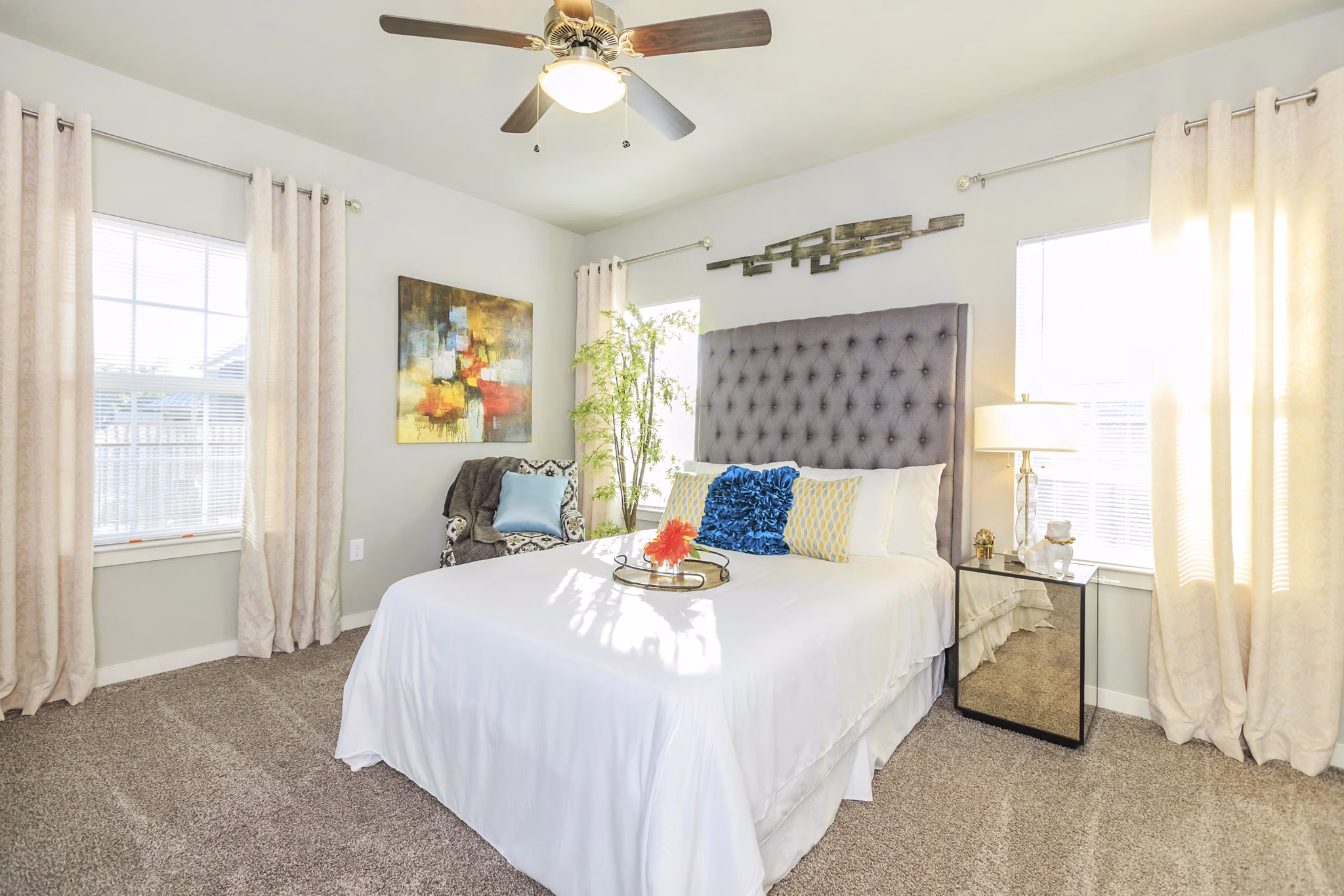 Bedroom featuring plush bedding and modern decor in Vantage at Boerne Apartments