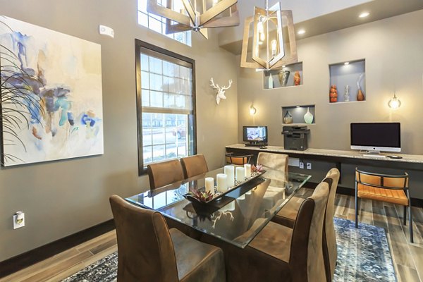 Modern business center with ergonomic seating and high-speed internet at Vantage at Boerne Apartments, offering a productive workspace