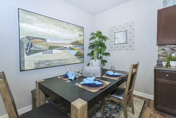 Dining area featuring modern decor and elegant lighting at Vantage at Boerne Apartments
