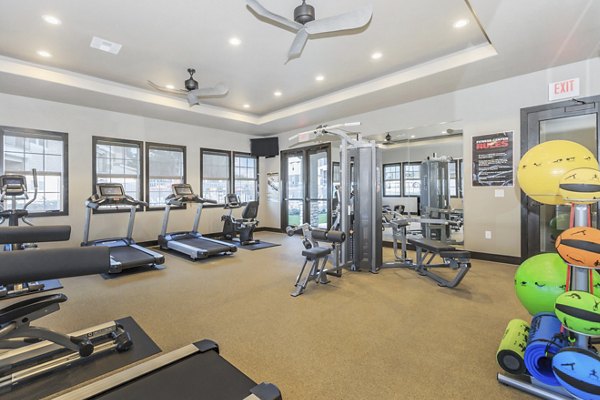State-of-the-art fitness center with modern equipment at Vantage at Boerne Apartments