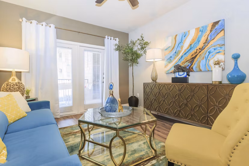 Spacious living room with modern furnishings in Vantage at Boerne Apartments