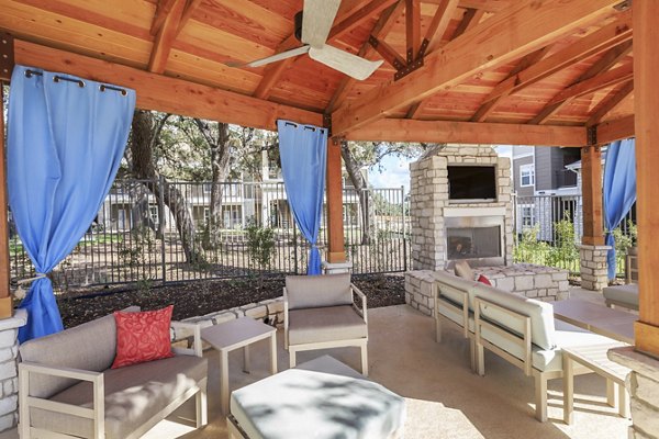 Spacious patio with modern seating at Vantage at Boerne Apartments, offering a tranquil outdoor retreat