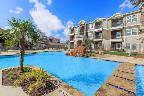 Luxurious poolside at Vantage at Boerne Apartments with scenic views