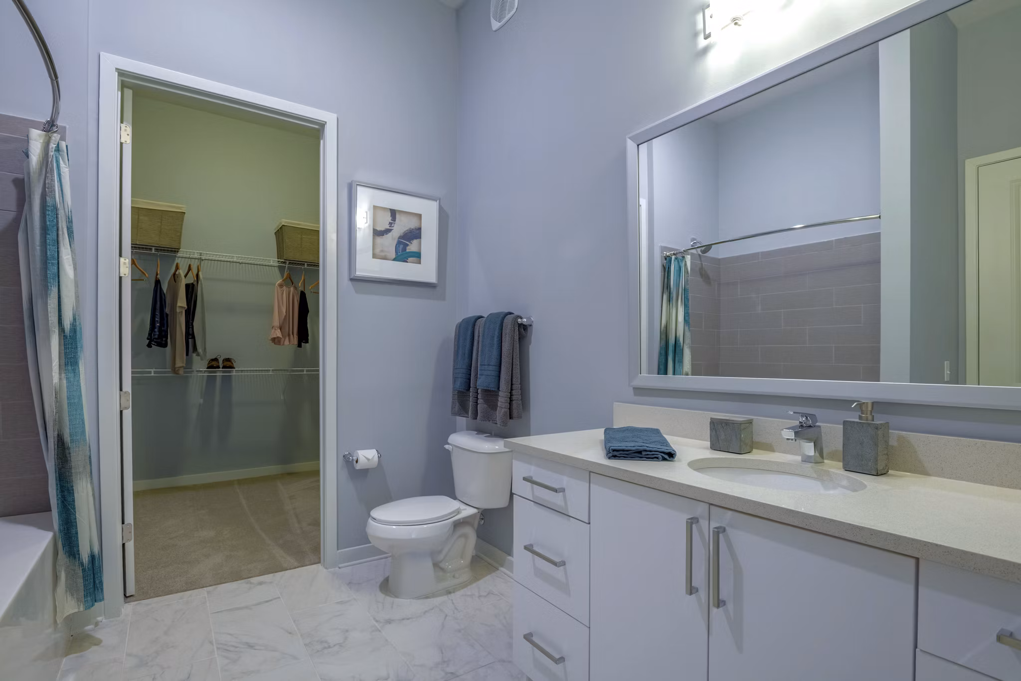 Luxurious bathroom with elegant fixtures in Aston City Springs Apartments, offering modern comfort and style for a premium living experience