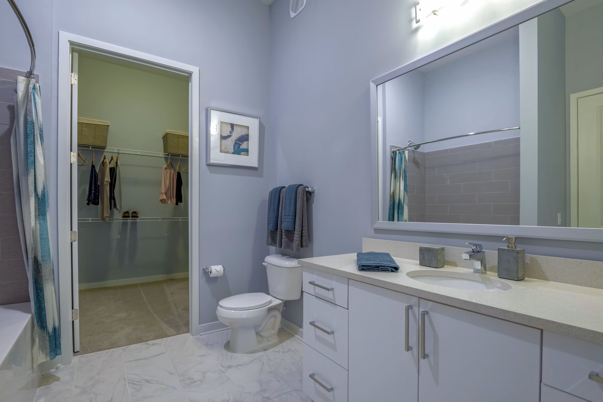 Luxurious bathroom with elegant fixtures in Aston City Springs Apartments, offering modern comfort and style for a premium living experience