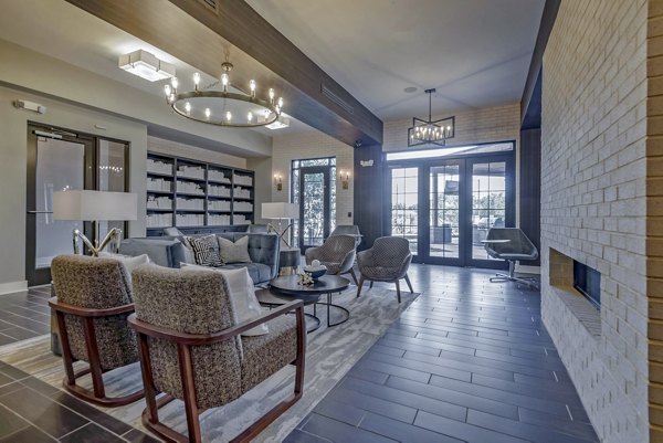 Clubhouse featuring modern design and community spaces at Aston City Springs Apartments