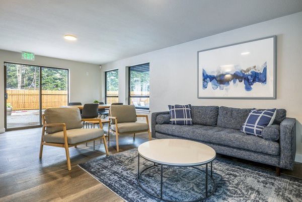 Modern clubhouse with stylish seating areas at Alvista 240 Apartments