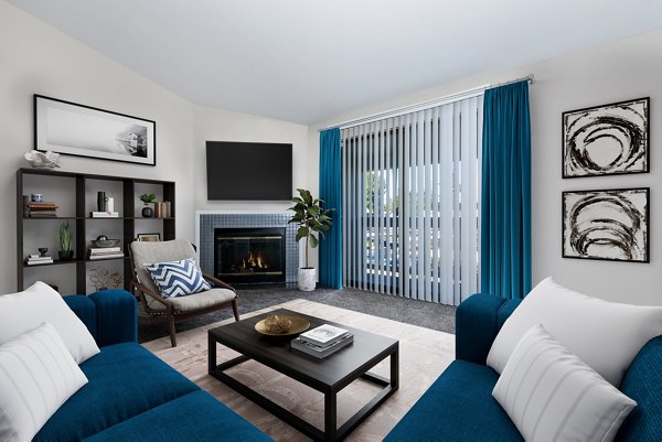 Luminous living room with chic decor at Alvista 240 Apartments, offering comfort and style in a desirable location