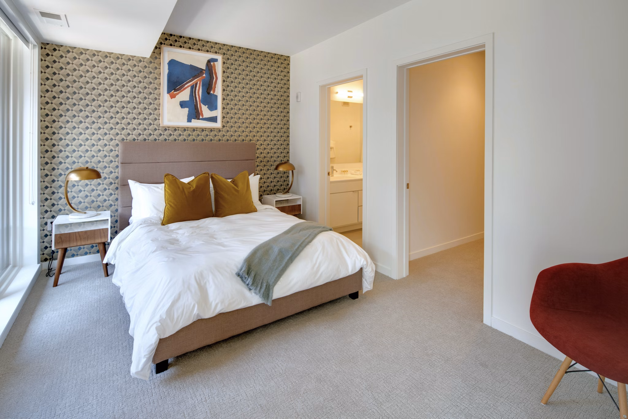 Cozy bedroom with modern furnishings at Second and Second Apartments
