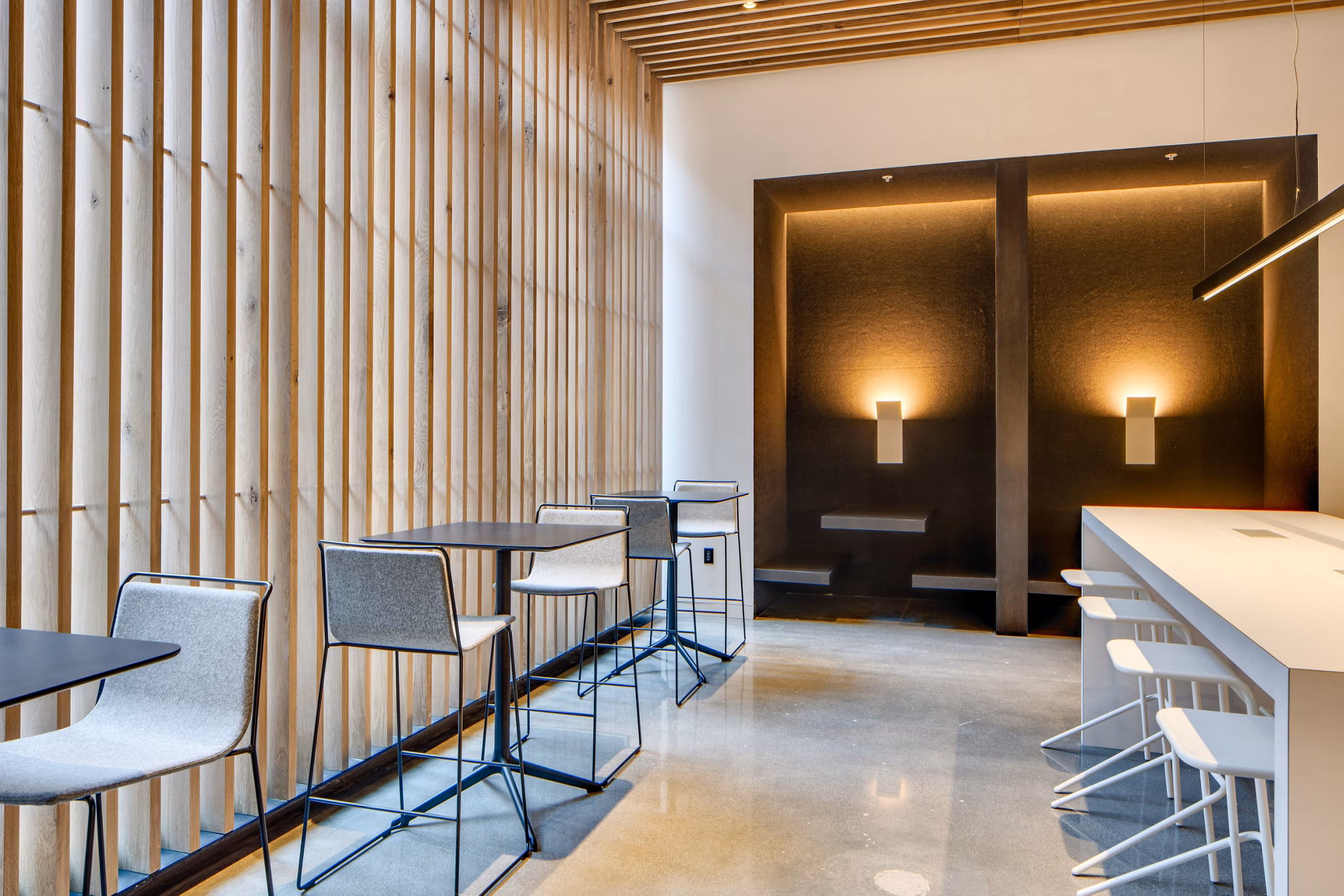 Clubhouse featuring modern finishes at Second and Second Apartments, a luxury property by Greystar
