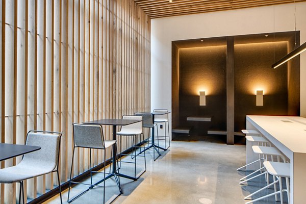 Clubhouse featuring modern finishes at Second and Second Apartments, a luxury property by Greystar