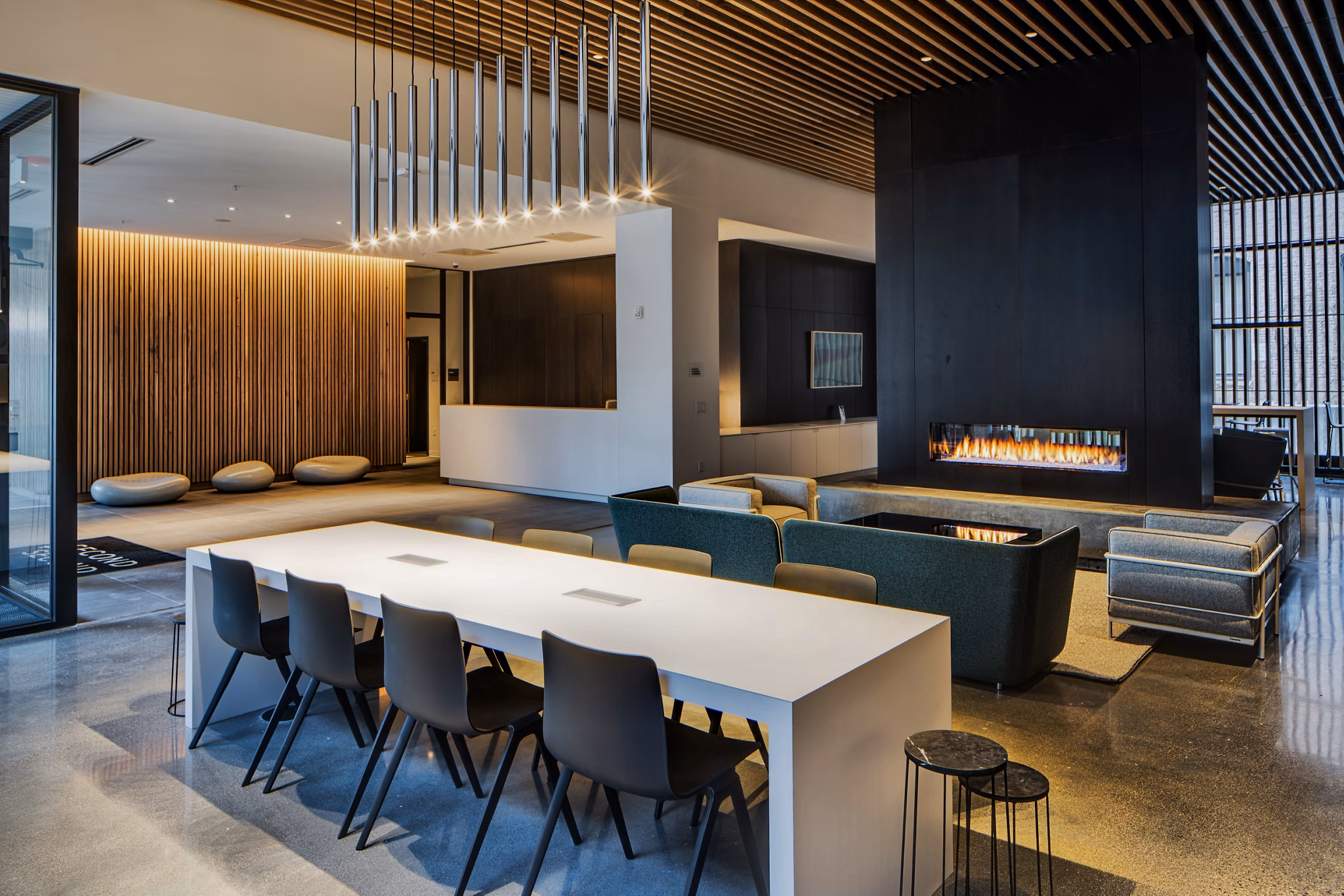 Clubhouse featuring modern furnishings and open seating at Second and Second Apartments, luxury community living in an urban setting