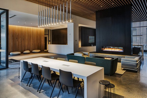 Clubhouse featuring modern furnishings and open seating at Second and Second Apartments, luxury community living in an urban setting