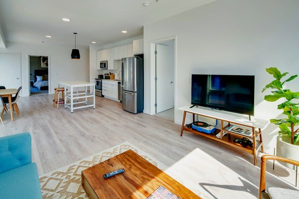 Cozy living room with modern decor at Second and Second Apartments