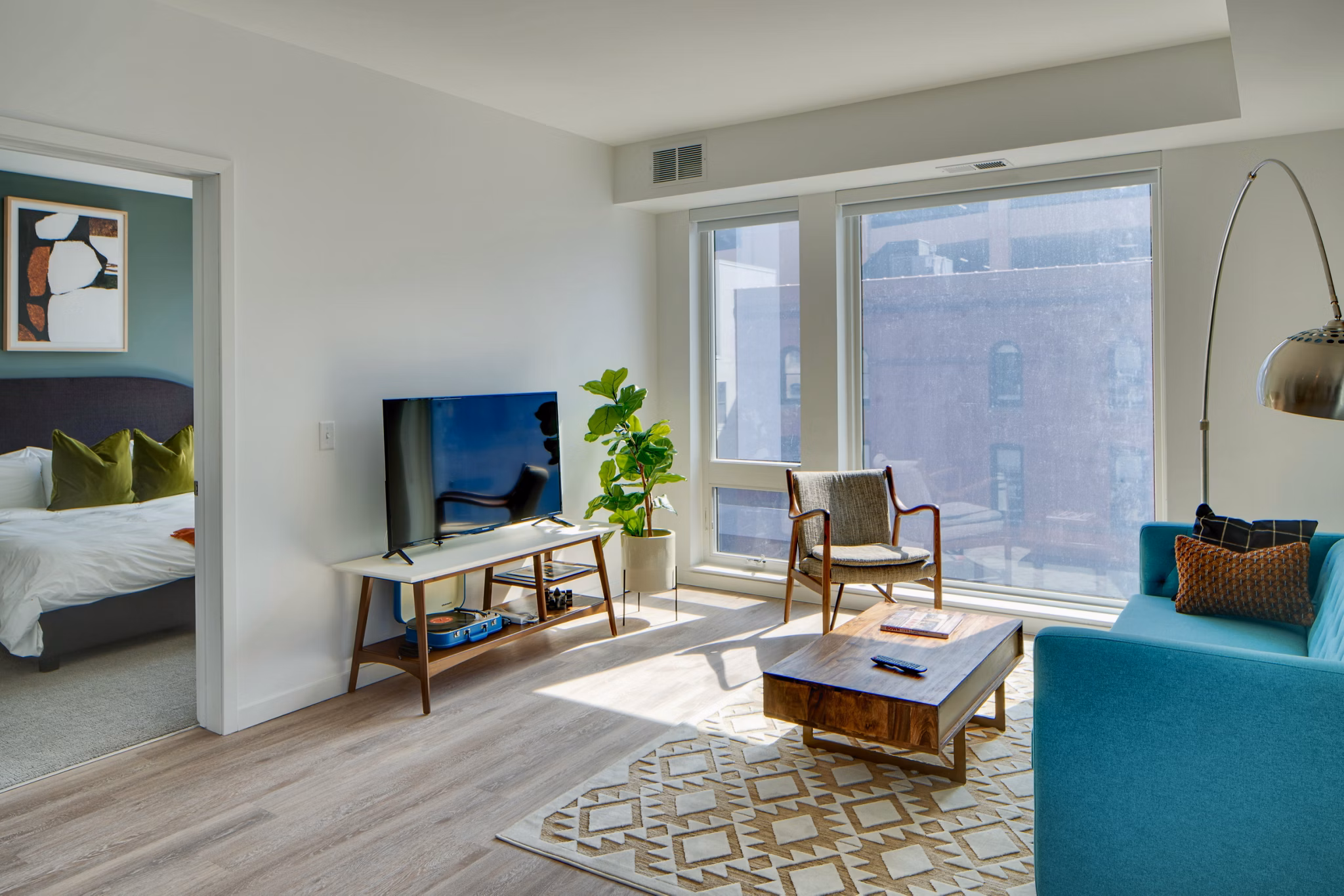 Spacious living room with modern decor in Second and Second Apartments