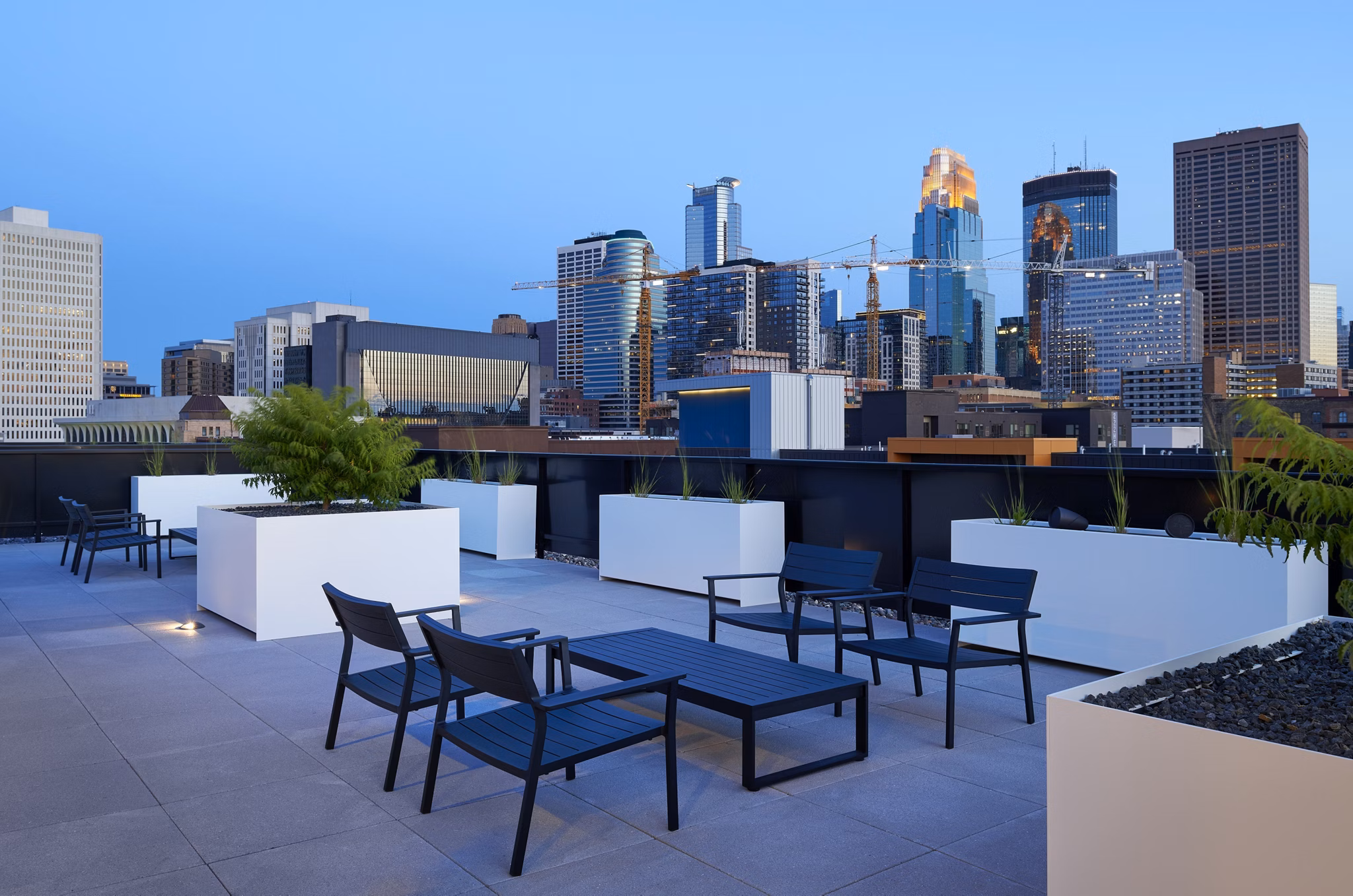 Expansive rooftop deck with lounge seating at Second and Second Apartments