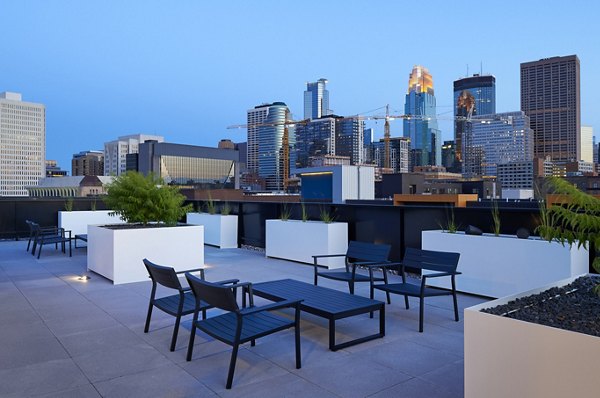 Expansive rooftop deck with lounge seating at Second and Second Apartments