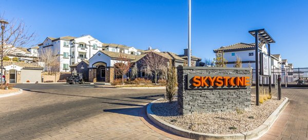 SkyStone Apartments: Modern entrance signage at luxury apartments in the city center