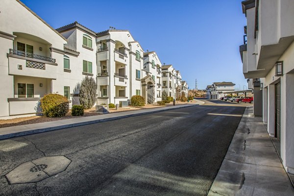 Covered parking garage at SkyStone Apartments with secure access and ample space for residents' vehicles