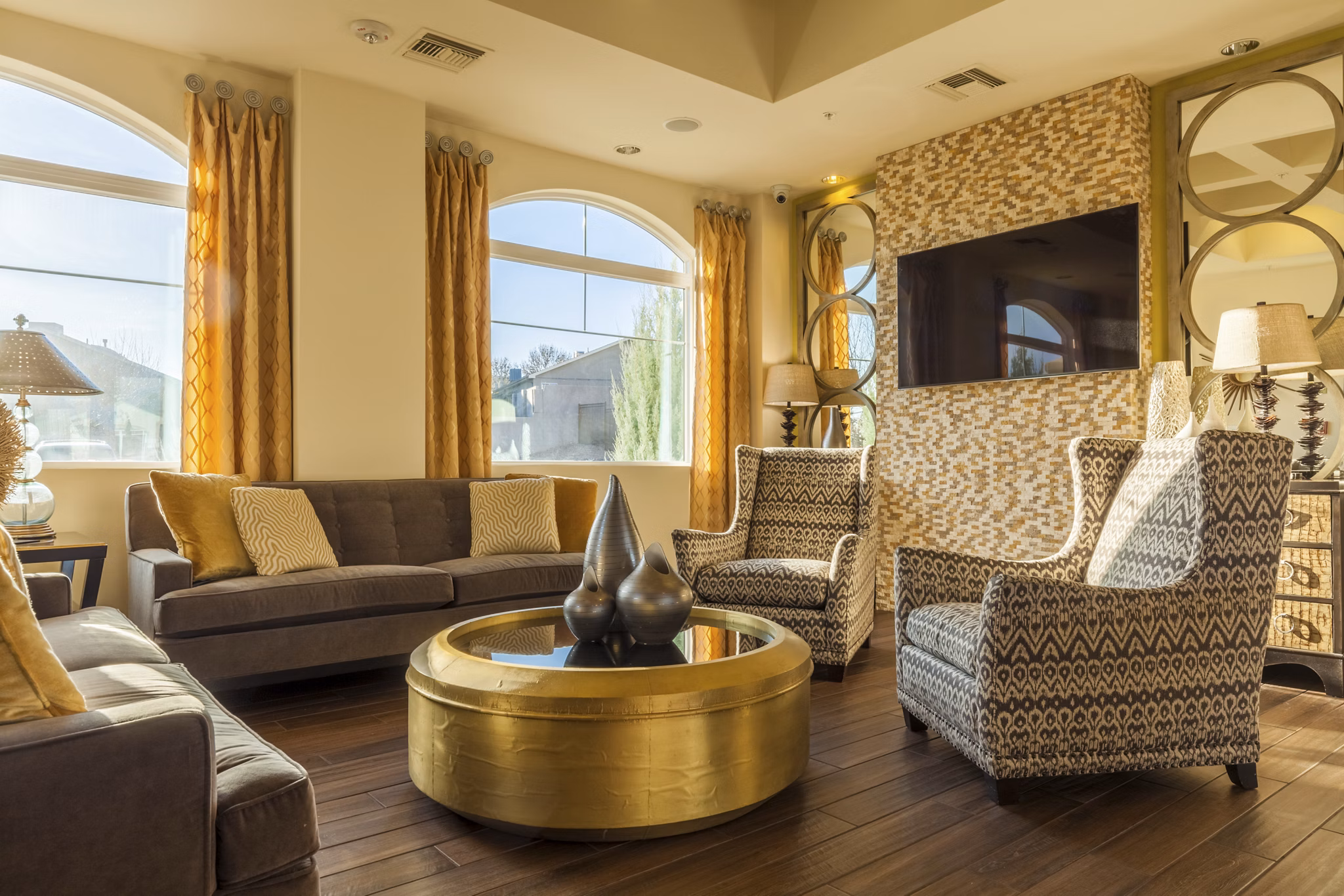 Modern clubhouse with elegant seating and pool table at SkyStone Apartments luxury community